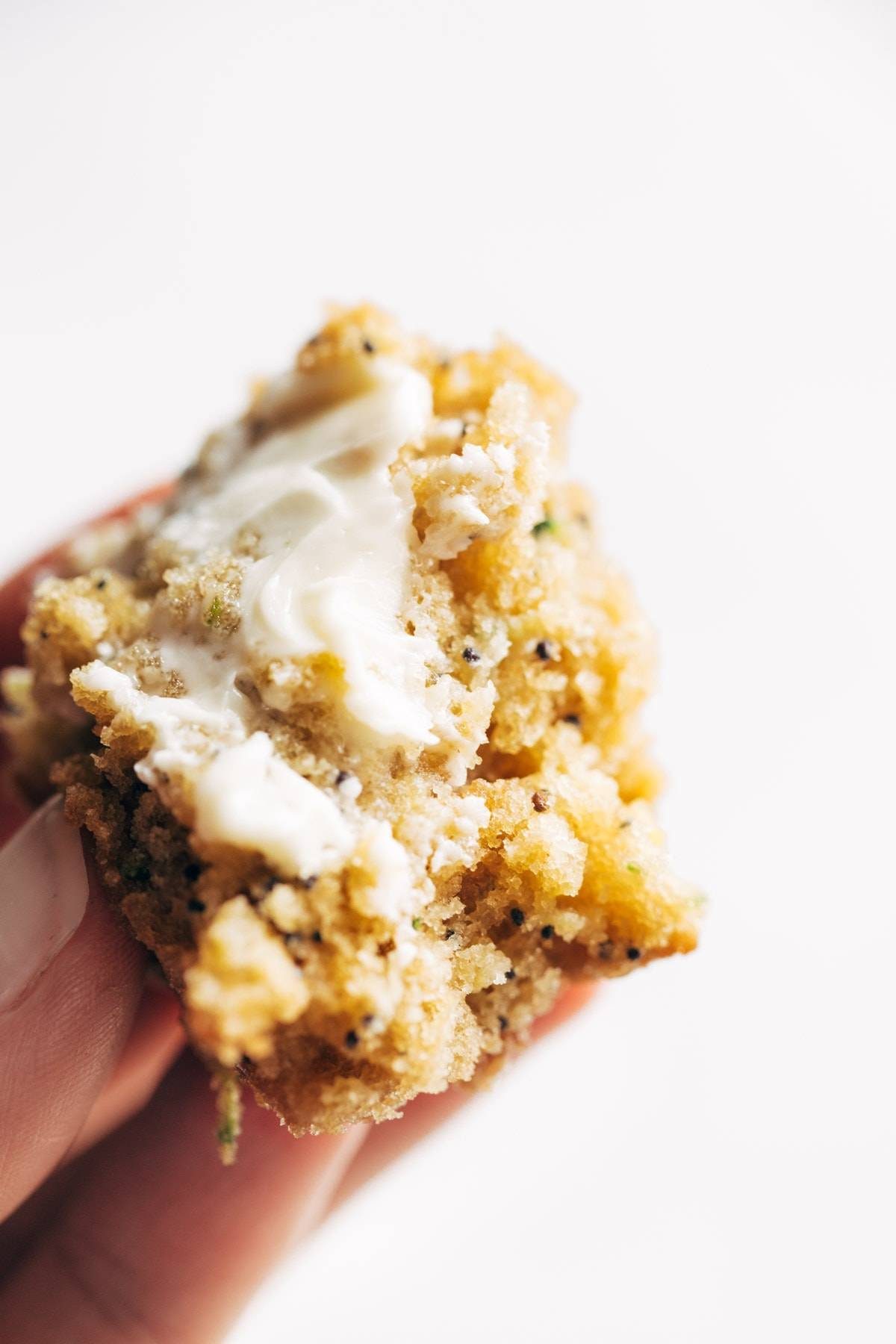 Butter on lemon poppyseed zucchini muffin.