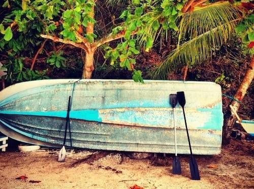 A photo of a canoe on its side.