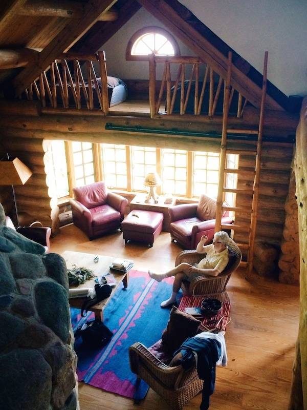 People in a log cabin.