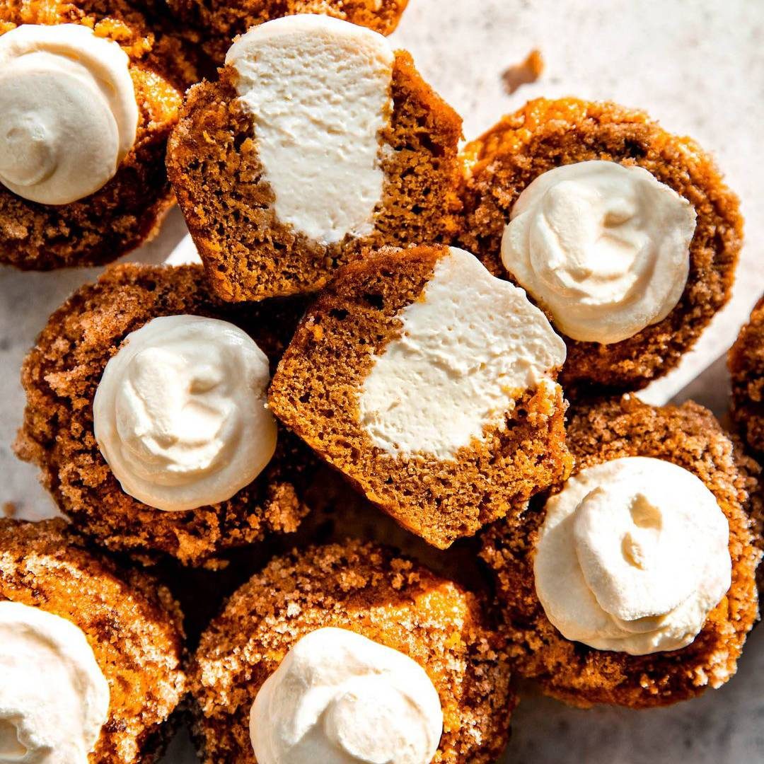 Pumpkin muffins with cream cheese filling.