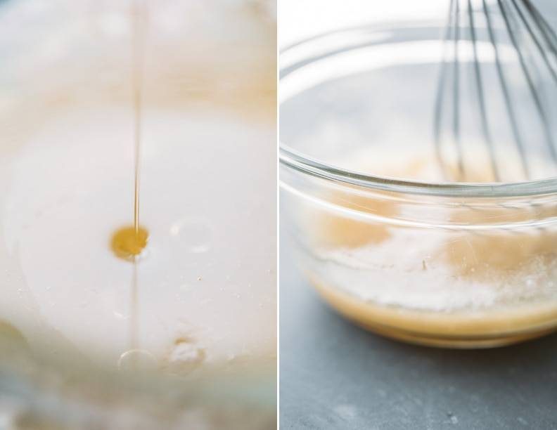 Citrus dressing in a mixing bowl with a whisk.