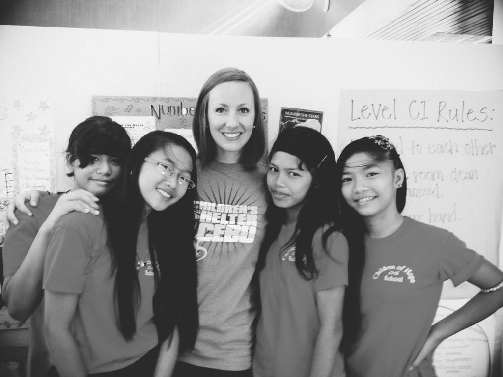 Women smiling at the camera.