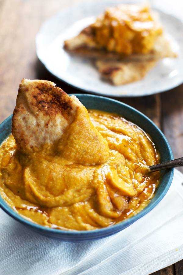 Roasted Garlic and Rosemary Pumpkin Hummus. 100 calories and totally addicting. From Pinch of Yum.