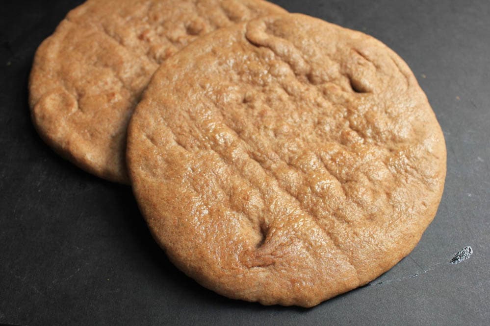 grilled-pita-pizzas-with-prosciutto-chanterelles-arugula-and-a-fried-egg-step-4