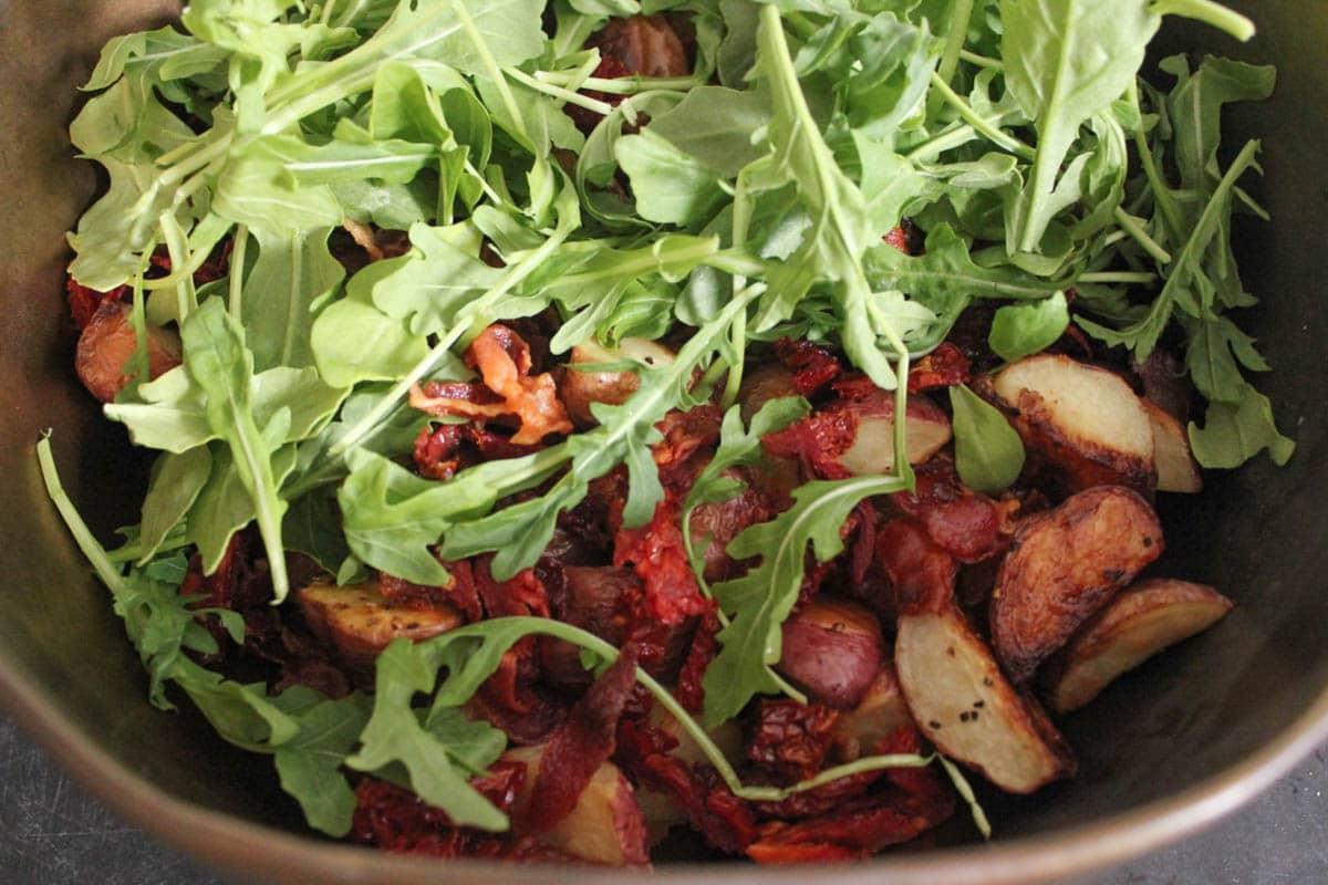 warm-roasted-potato-salad-with-pancetta-sun-dried-tomatoes-and-arugula-step-7