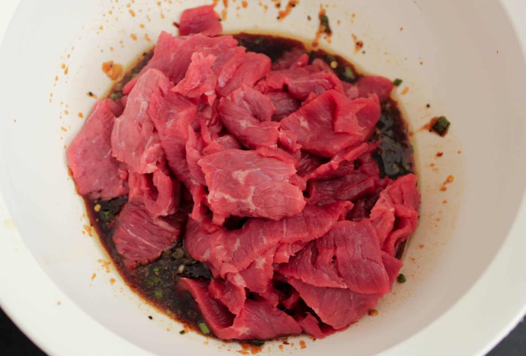 korean-steak-bulgogi-sandwiches-with-slaw-creamy-spicy-sauce-fried-eggs-step-2