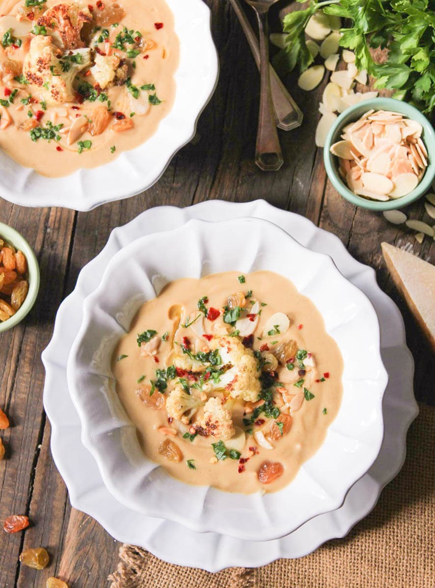 roasted-cauliflower-soup-with-parmesan-toasted-almonds-golden-raisins