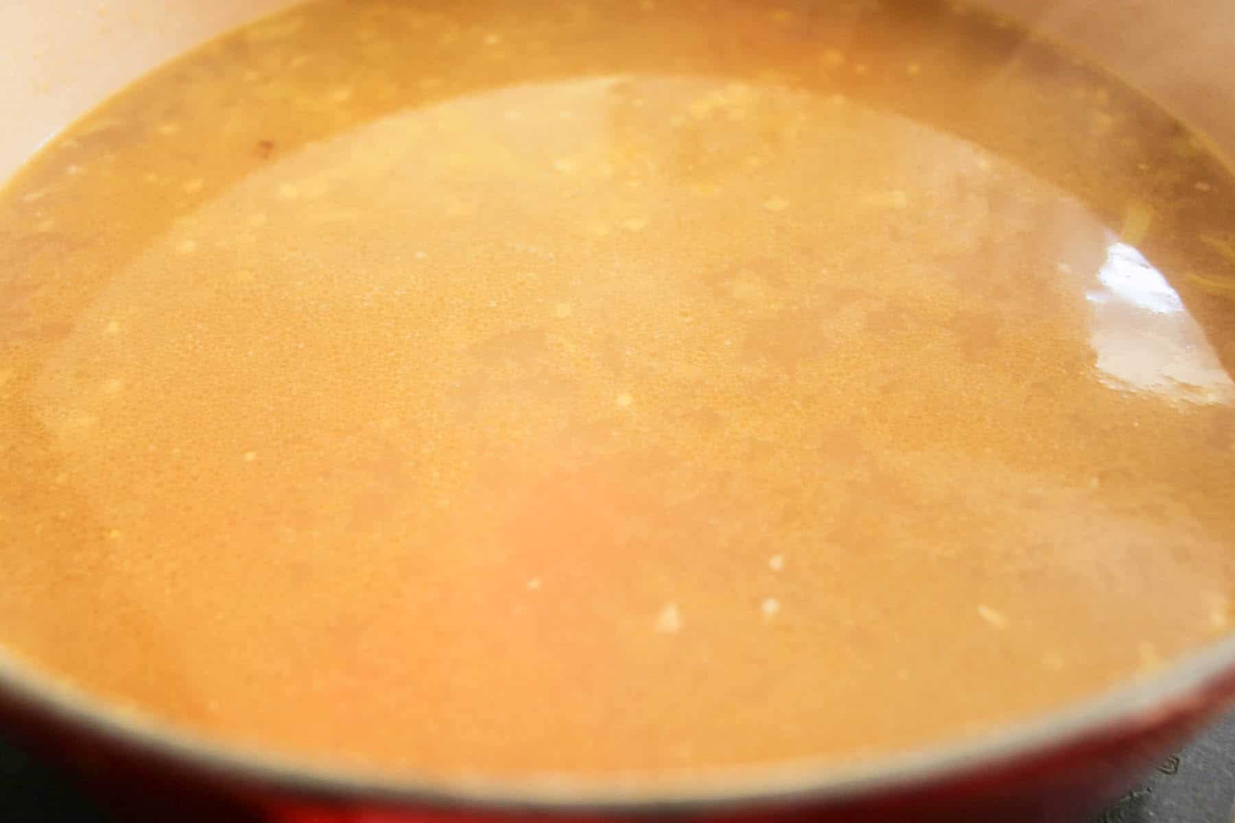 Lemon-orzo-soup-with-spring-vegetables-and-parmesan-step-2