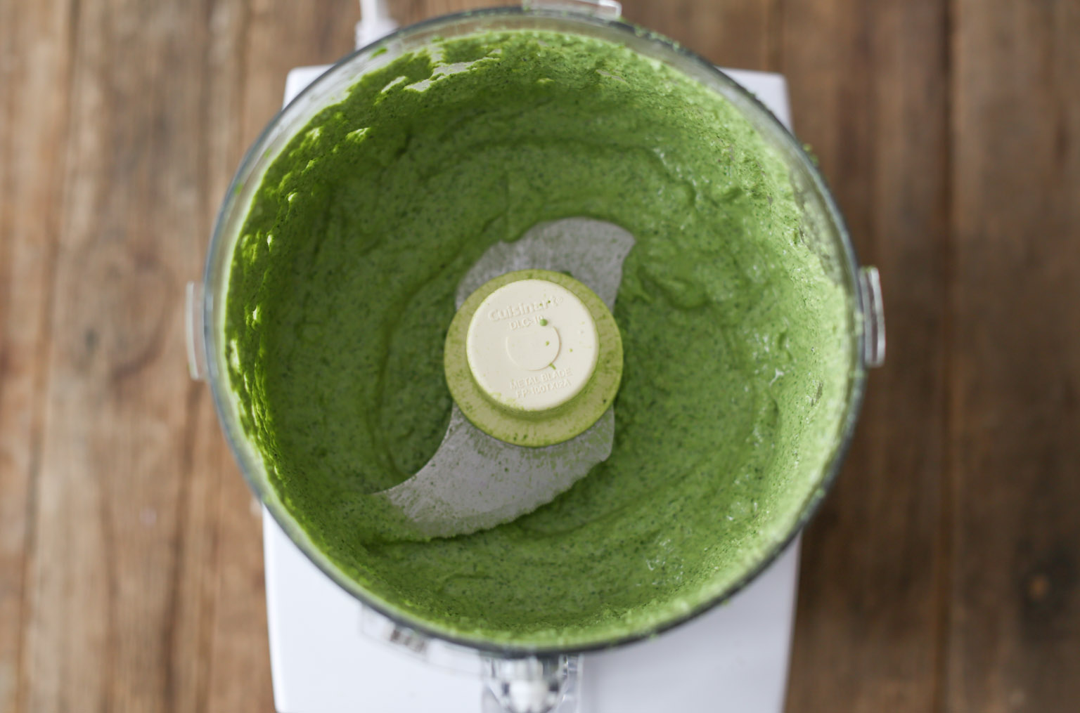 Sausage and Sun-Dried Tomato Pasta with Arugula-Goat Cheese Pesto