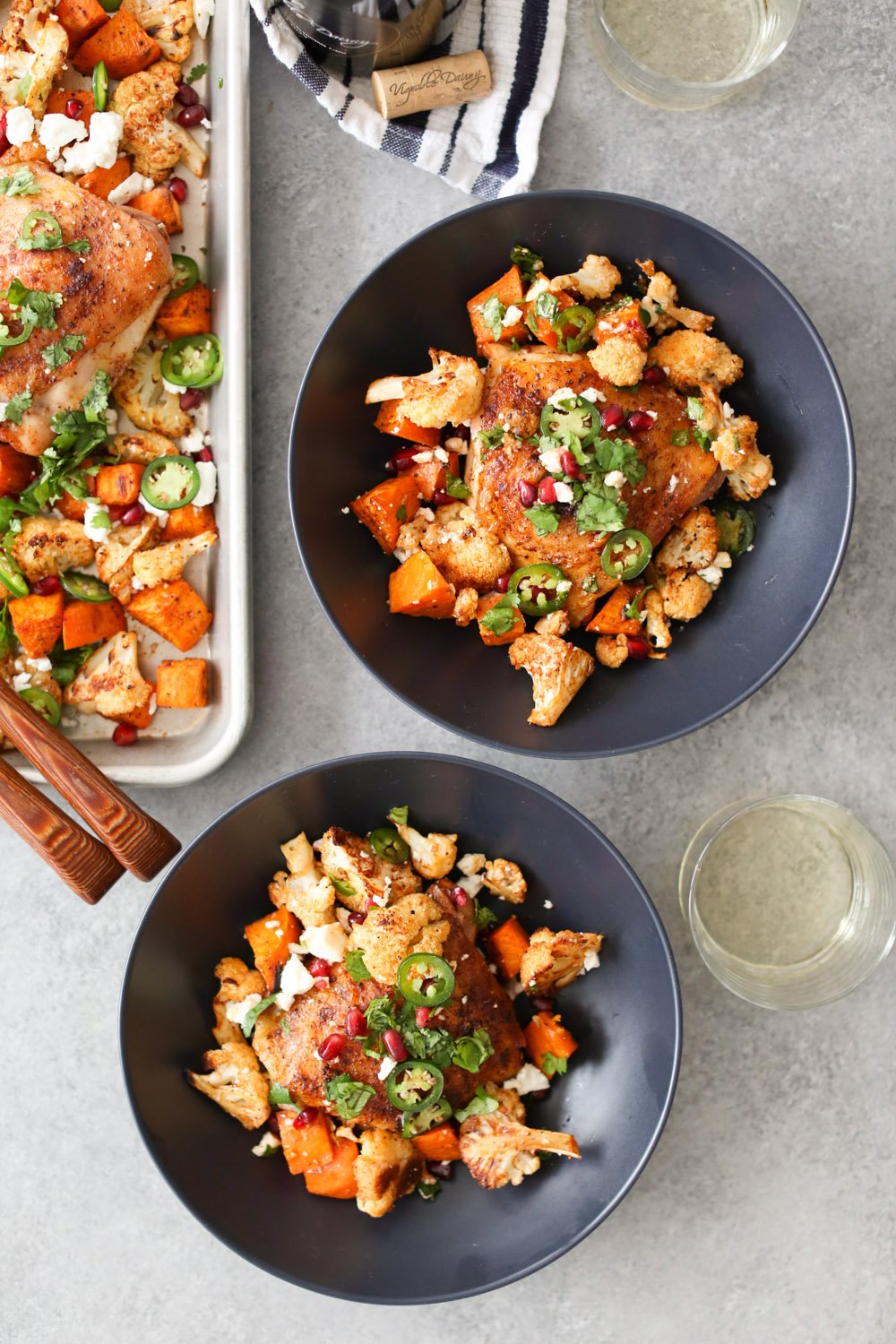 Sheet Pan Chicken Thighs with Cauliflower, Sweet Potatoes, and Pomegranate